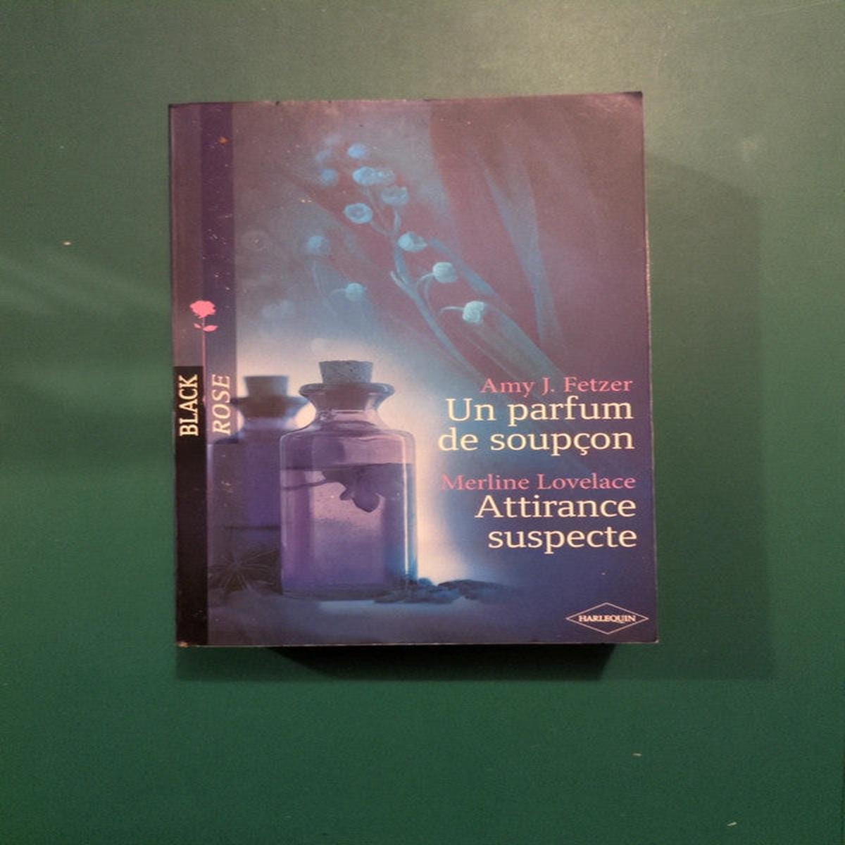 Used book  Amy J. Fetzer, A Taste of Suspicion; Merline Lovelace, Suspicious Attraction